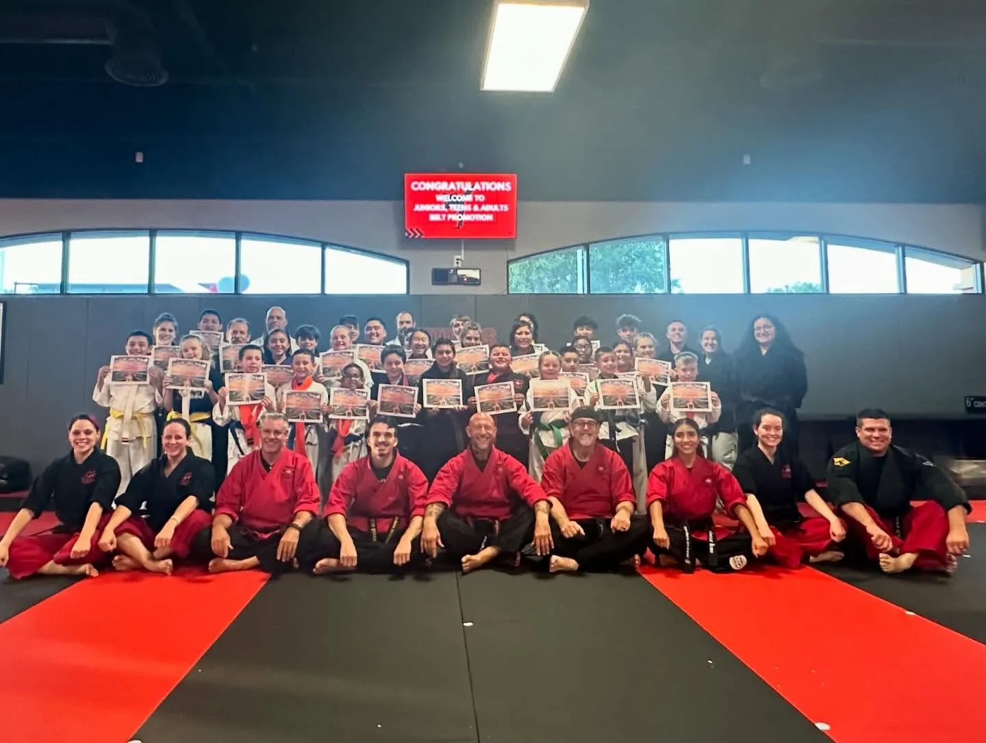 Carlos Machado students lined up at a belt promotion in Carrollton, TX
