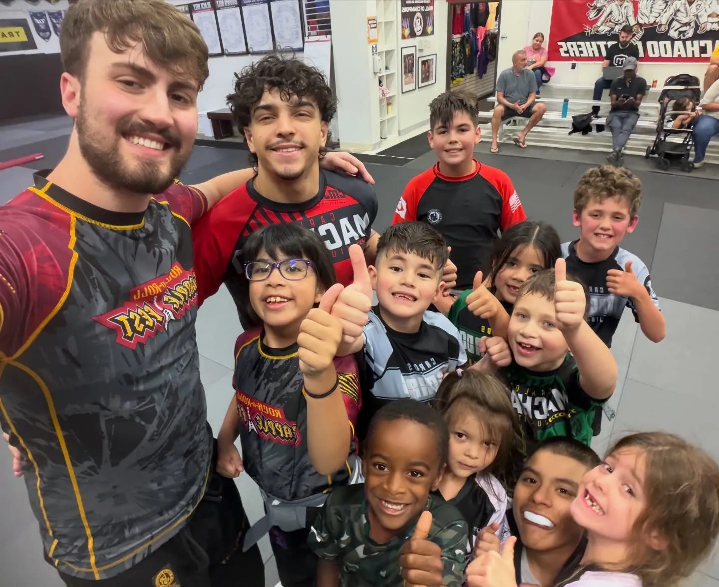 Machado Method kids practicing grappling control on the mat in Carrollton, TX