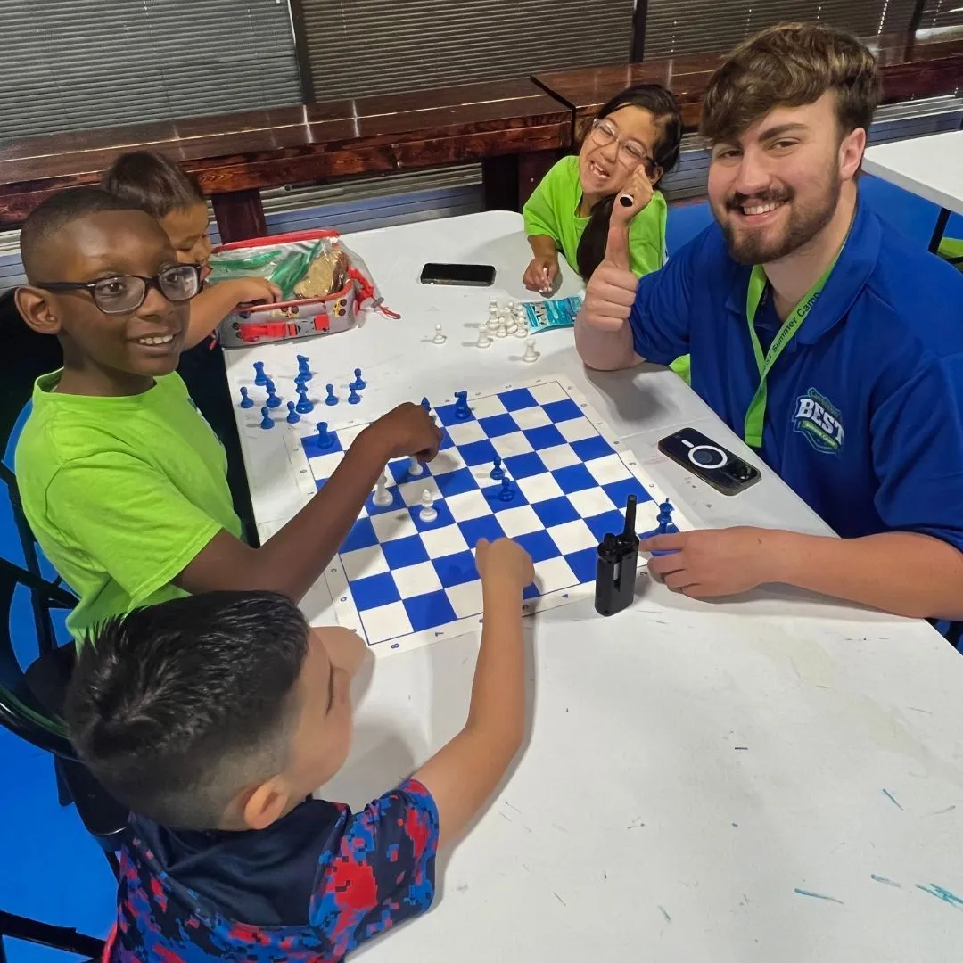 A Carrollton's Best summer camper smiling during a camp day in Carrollton, TX
